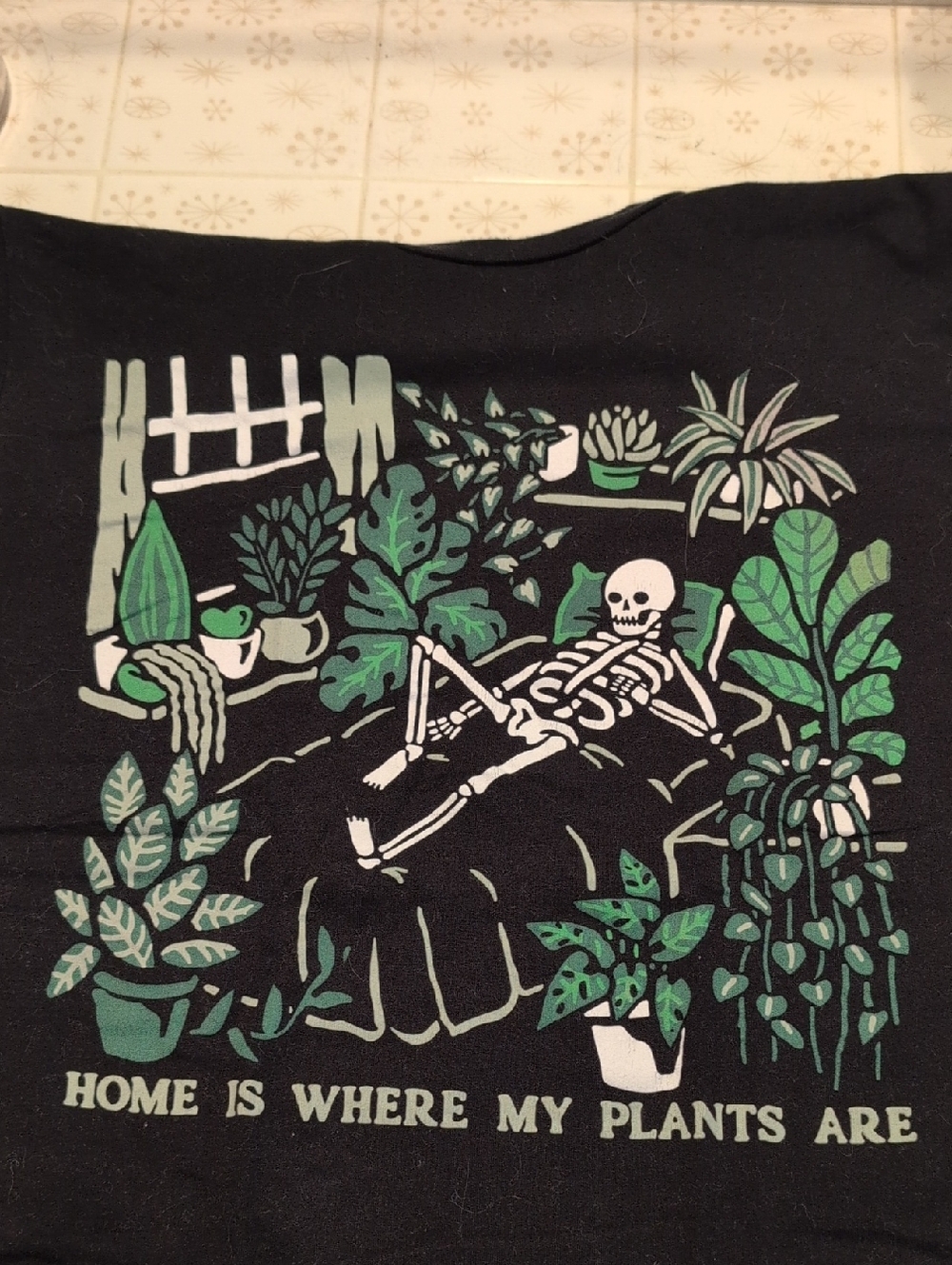 Wicked Black Graphic Tee - 'Home Is Where My Plant Are' Skeleton Plant Design